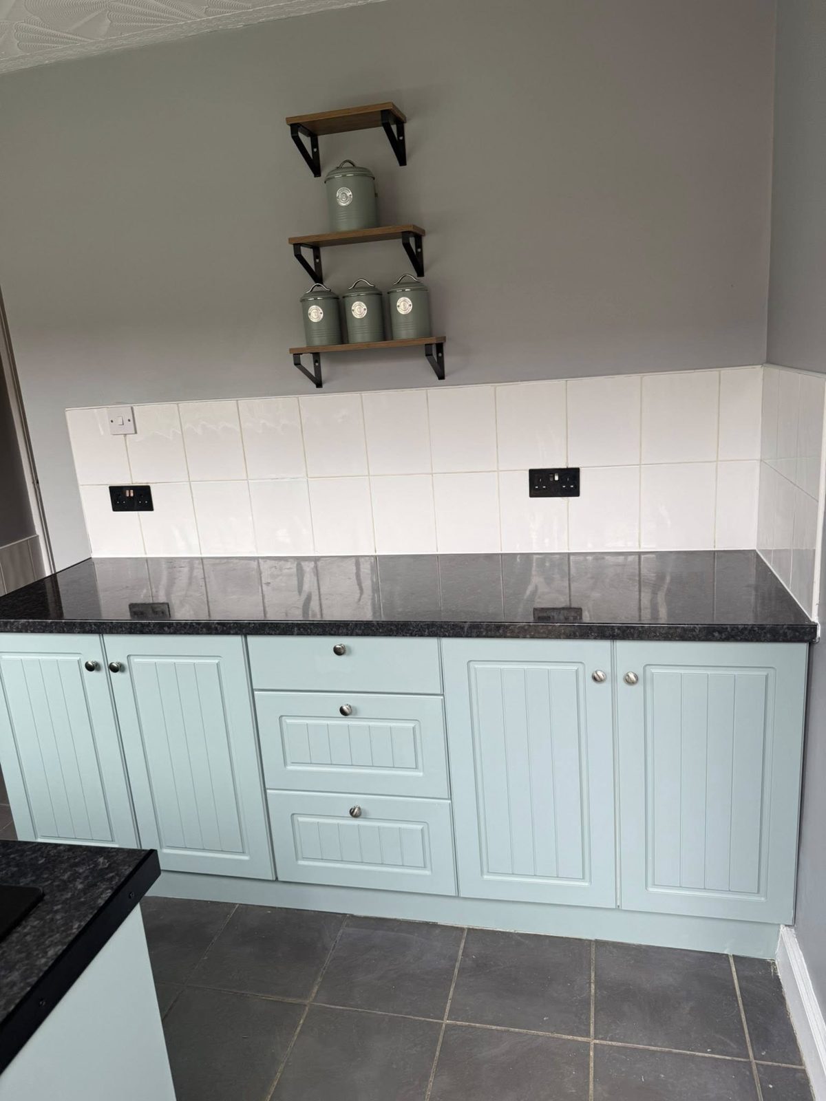 Refreshed kitchen with painted units, new worktop and sink